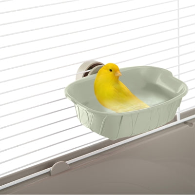 Imac Vogelbad Assorti met een gele vogel die zich verfrischt in het water, ideaal voor vogels in kooien.